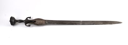 Persian sword. Iron mount nielloed of silver.

Half...