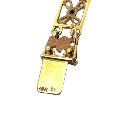 OR 18K / 18K GOLD
Bracelet ajouré en or jaune...