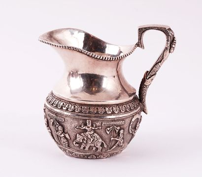 SILVER
Silver tea service with oriental motif...