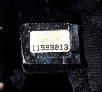 CHANEL
Sac à main modèle grand shopping en...
