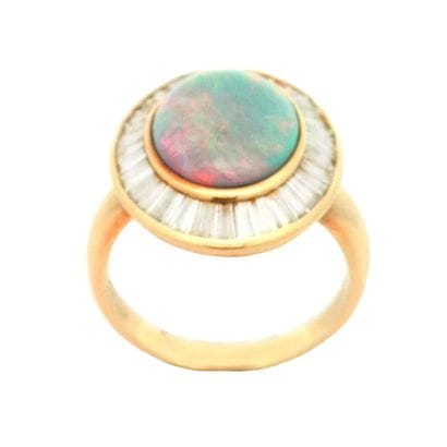 OR 14K, OPALE, DIAMANTS
Bague en or jaune...