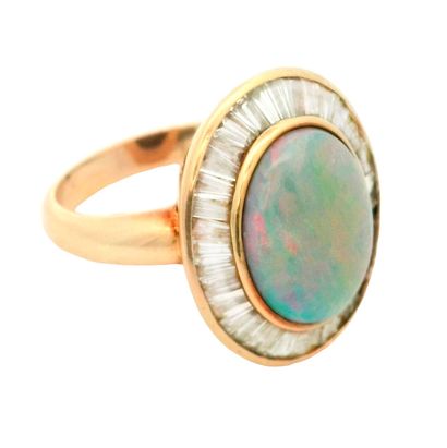 OR 14K, OPALE, DIAMANTS
Bague en or jaune...