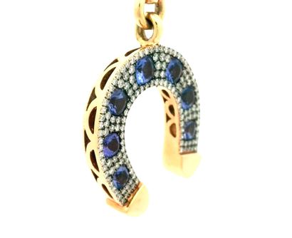 OR 18K, TANZANITE, DIAMANTS
Pendentif en...