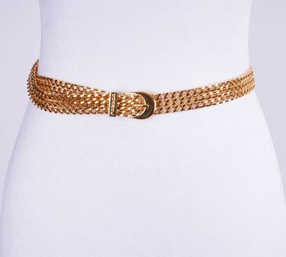 CHANEL
Two (2) Chanel gold belts, one composed...