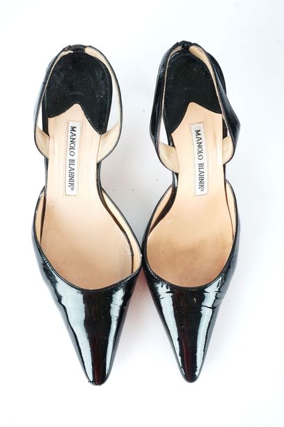 MANOLO BLAHNIK
Three (3) pairs of Manolo...