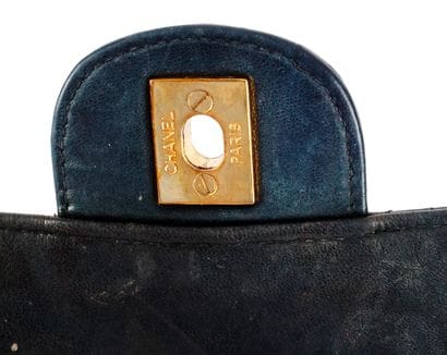 CHANEL
Double-sided Chanel bag in black patent...