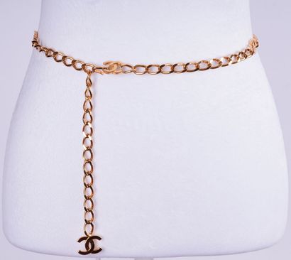 CHANEL
Two (2) Chanel gold belts, one composed...