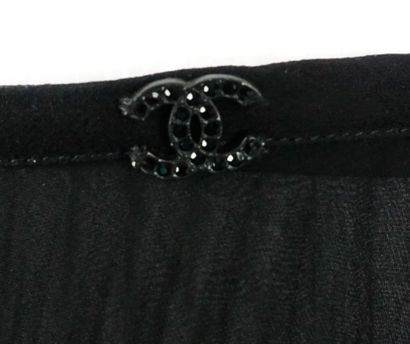 CHANEL
Deux jupes Chanel plissées.
Taille:...