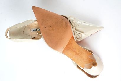 MANOLO BLAHNIK
Quatre (4) paires de chaussures...