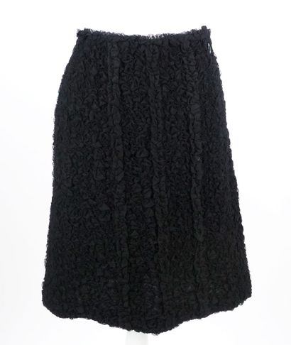 CHANEL
Deux jupes Chanel, une en fine tulle...