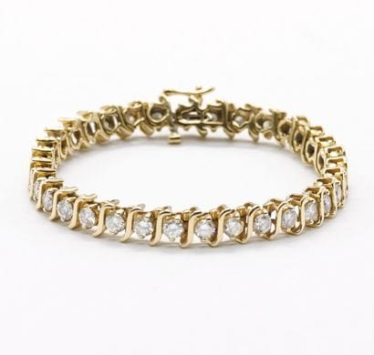 OR 14K, DIAMANTS / 14K GOLD, DIAMONDS
Bracelet...