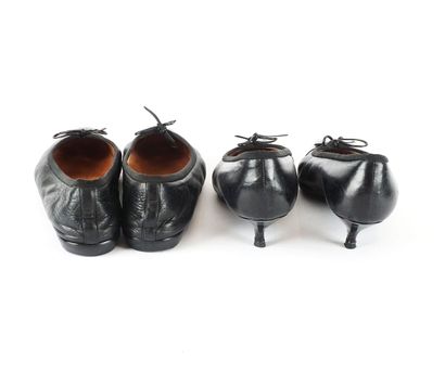 CHANEL
Two pairs of black leather Chanel...
