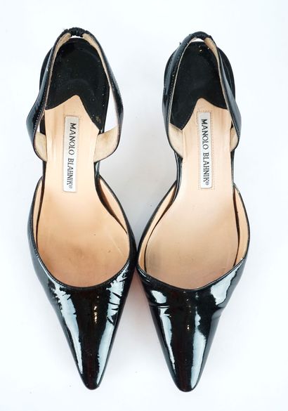 MANOLO BLAHNIK
Quatre (4) paires de chaussures...