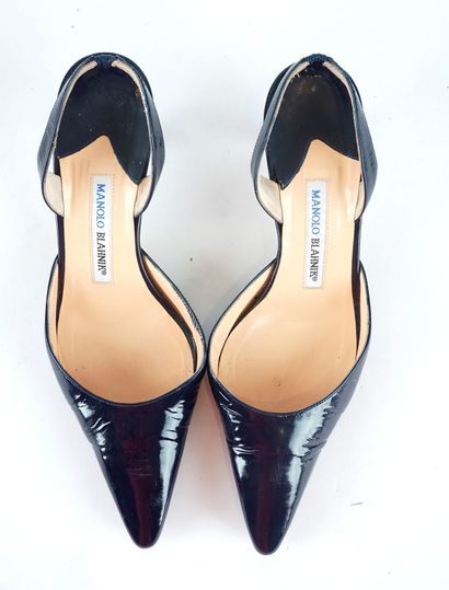 MANOLO BLAHNIK
Quatre (4) paires de chaussures...