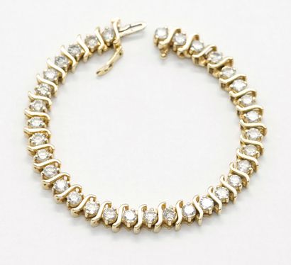 OR 14K, DIAMANTS / 14K GOLD, DIAMONDS
Bracelet...