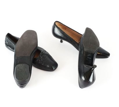 CHANEL
Two pairs of black leather Chanel...