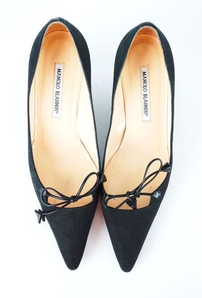 MANOLO BLAHNIK
Three (3) pairs of Manolo...