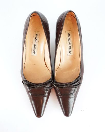 MANOLO BLAHNIK
Three (3) pairs of Manolo...