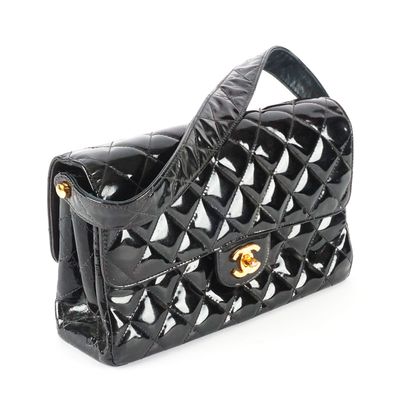 CHANEL
Double-sided Chanel bag in black patent...