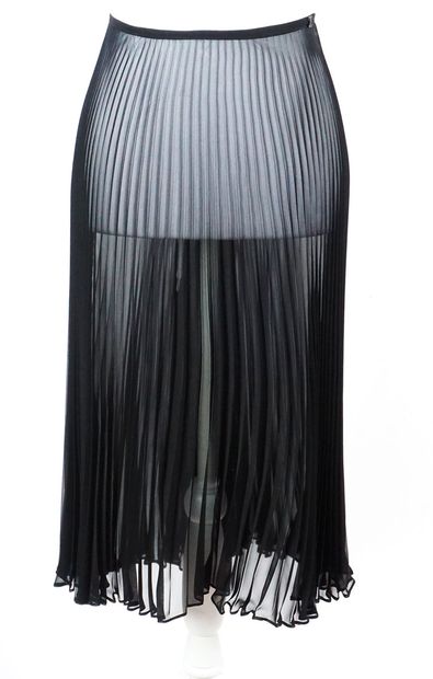 CHANEL
Deux jupes Chanel plissées.
Taille:...
