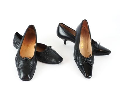 CHANEL
Two pairs of black leather Chanel...
