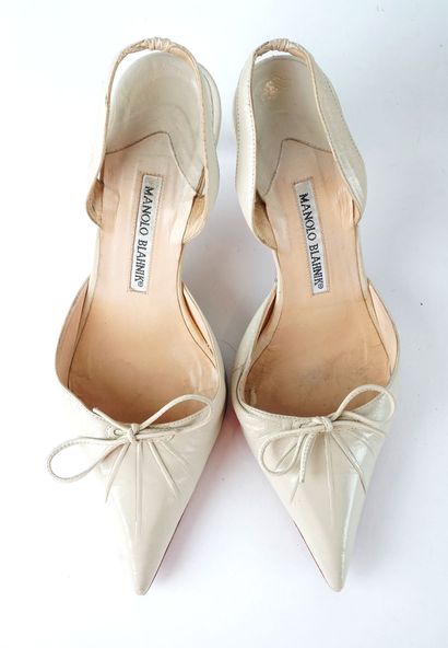 MANOLO BLAHNIK
Quatre (4) paires de chaussures...