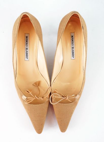 MANOLO BLAHNIK
Three (3) pairs of Manolo...
