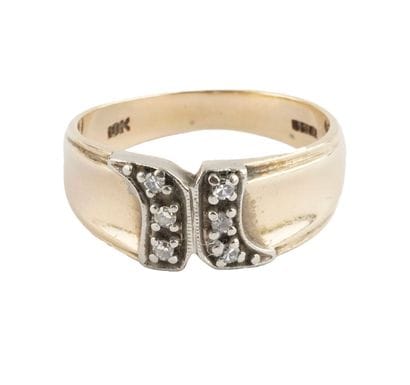 10K GOLD
10K yellow gold ring set with small...