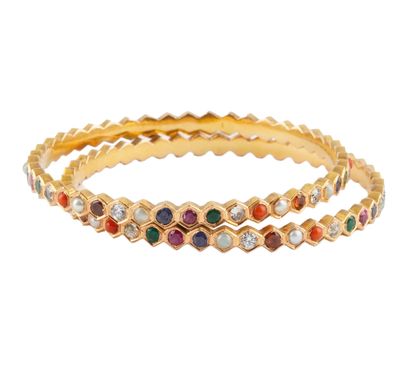 18K GOLD, GEMS
Two (2) bracelets in 18K yellow...