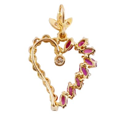 18K GOLD, RUBIES, DIAMONDS
Heart-shaped pendant...