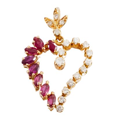 18K GOLD, RUBIES, DIAMONDS
Heart-shaped pendant...