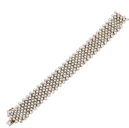 18K GOLD, DIAMONDS
Large 18K white gold braclet...