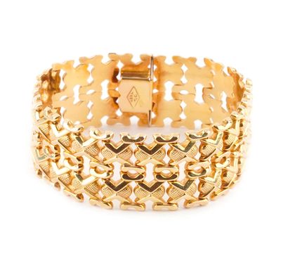 18K GOLD
Wide articulated bracelet in 18K...
