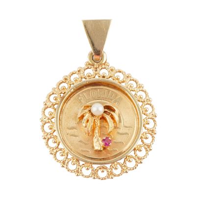 14K GOLD
Round pendant “Florida” in 14K yellow...