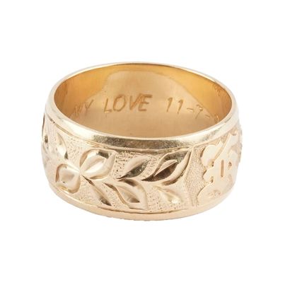 14K GOLD
Ring in 14K yellow gold with foliage...