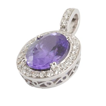 18K GOLD, TANZANITE
18K white gold pendant...