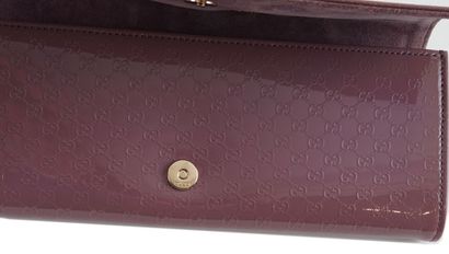 GUCCI
Pochette Gucci Microguccissima en Cipria...