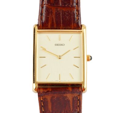 SEIKO
Montre Seiko en métal doré, boîtier...