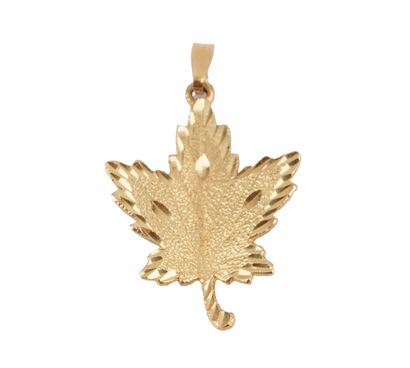 10K GOLD
10K yellow gold pendant in the shape...