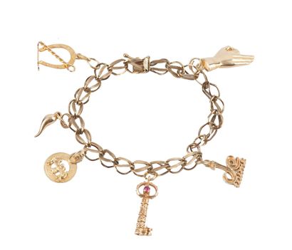 OR 10K / 10K GOLD
Bracelet gourmette et breloques...