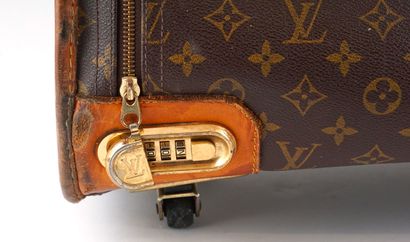 LOUIS VUITTON
Valise Louis Vuitton en toile...