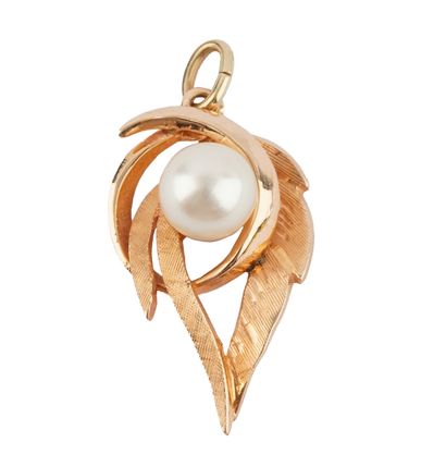 OR 14K / 14K GOLD
Pendentif stylisant une...
