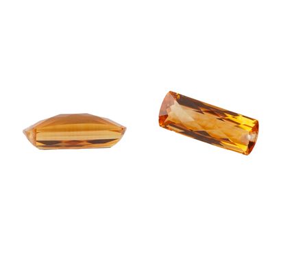 CITRINE 31.5CT
Lot comprising 2 heated natural...