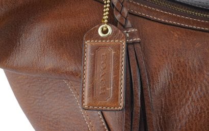 COACH
Sac Coach en cuir marron, une anse...