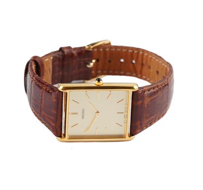 SEIKO
Montre Seiko en métal doré, boîtier...