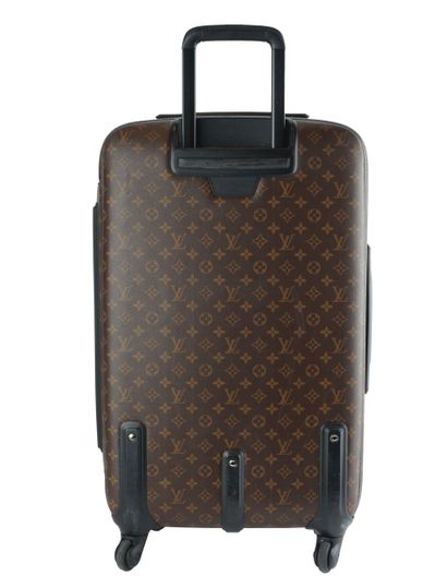 LOUIS VUITTON
Louis Vuitton rolling suitcase...