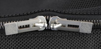 LOUIS VUITTON
Louis Vuitton travel shoulder...