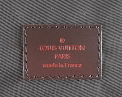 LOUIS VUITTON
Louis Vuitton rolling duffel...