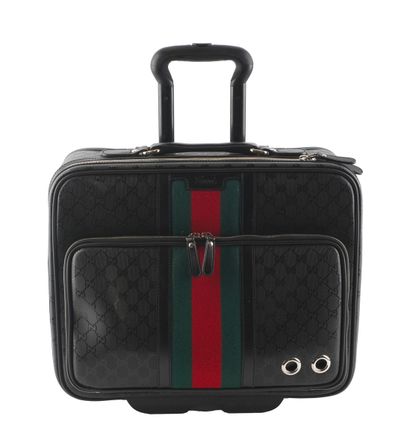 GUCCI
Gucci rolling cabien bag in Monogram...