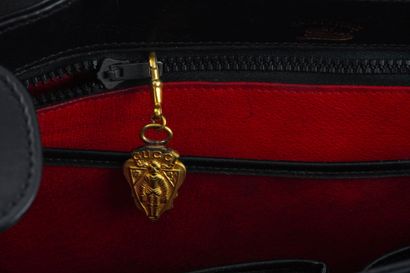GUCCI
Vintage Gucci bag in black leather,...